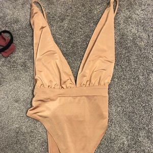 Tan body suit